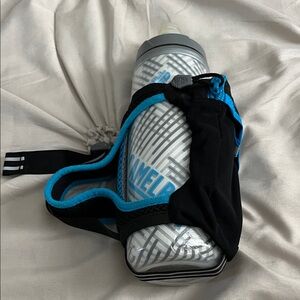 CamelBak Handheld Water Bottle with Strap & Zipper Pocket Running Hydration
